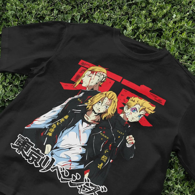 Here at Everythinganimee we have the best anime shirts in the world.
Showcase your love for Tokyo Revengers with this stunning Anime Themed T-Shirt. Featuring three iconic characters in a powerful and intense design, this tee brings the rebellious energy of the series to life.