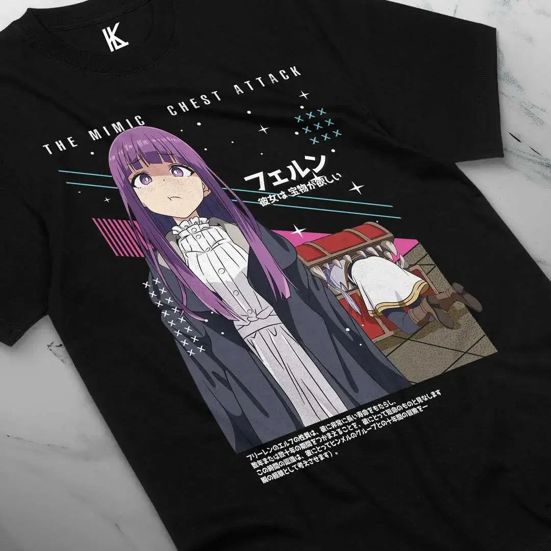 Here at Everythinganimee we have the best anime shirts in the world.
Embrace the humor and adventure of Frieren with this Mimic Chest Fern tee. Showcasing Fern’s iconic expression in a memorable scene, this shirt is perfect for fans who love the quirky and lighthearted moments of the series. 