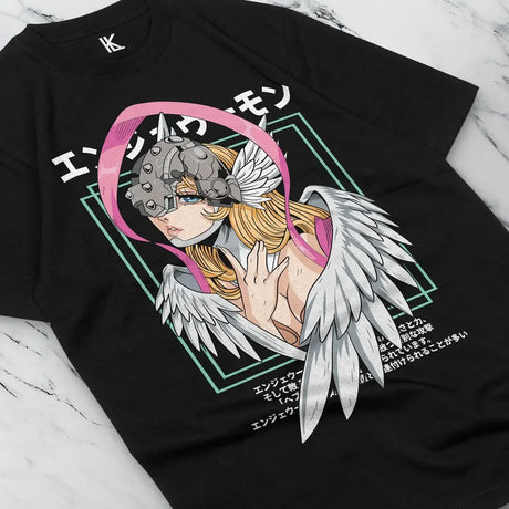 Here at Everythinganimee we have the best anime shirts in the world.
Embrace the mystical power of the Digital World with the Celestial Digimon Tee, featuring one of the most iconic angelic Digimon. This design captures her grace and strength.