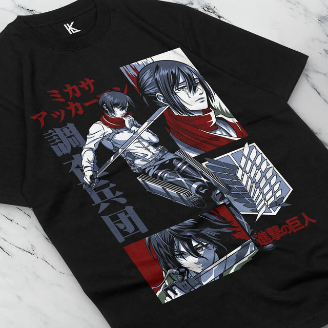 Here at Everythinganimee we have the best anime shirts in the world.
Step into the world of Attack on Titan with this intense Mikasa Ackerman tee, showcasing her fierce dedication and unmatched combat skills. 