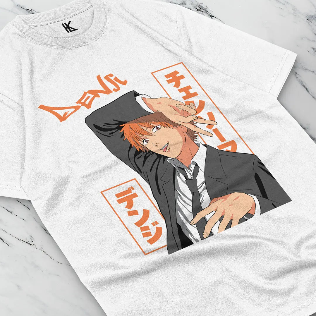 Here at Everythinganimee we have the best anime shirts in the world.
Unleash the power of Chainsaw Man with this striking Denji Tee, featuring the unpredictable and fearless Denji from the anime. The bold design captures Denji’s devil-may-care attitude.