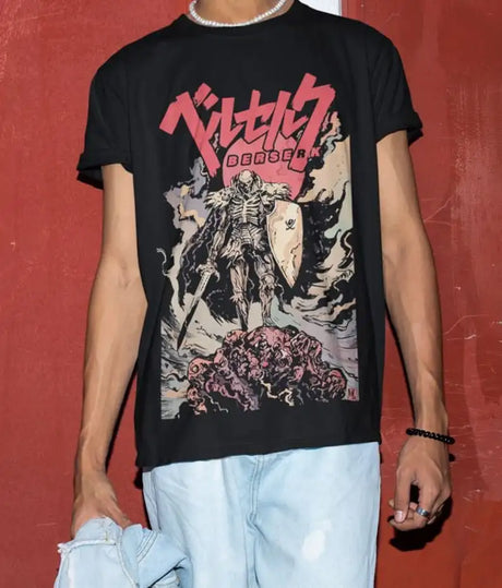 Embrace the dark fantasy of Berserk with this striking Skull Knight graphic tee. If you are looking for more Berserk Merch, We have it all! | Check out all our Anime Merch now!