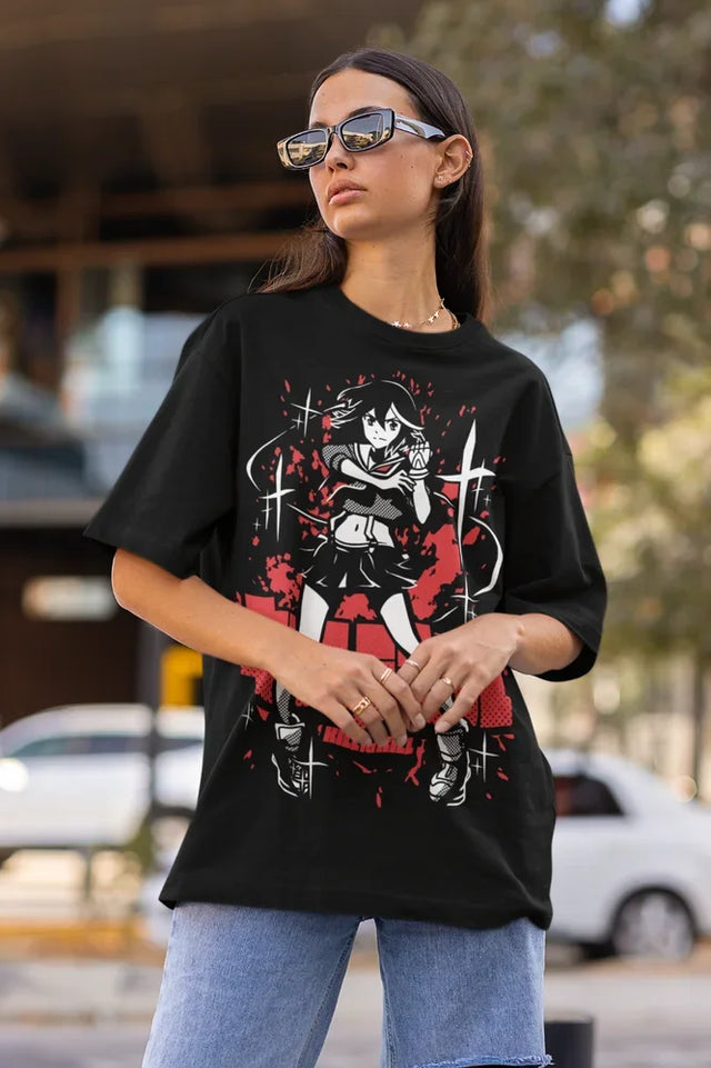 Channel the fierce energy of Ryuko Matoi with this bold and striking tee in a powerful pose.  If you are looking for more Kill La Kill Merch, We have it all! | Check out all our Anime Merch now!