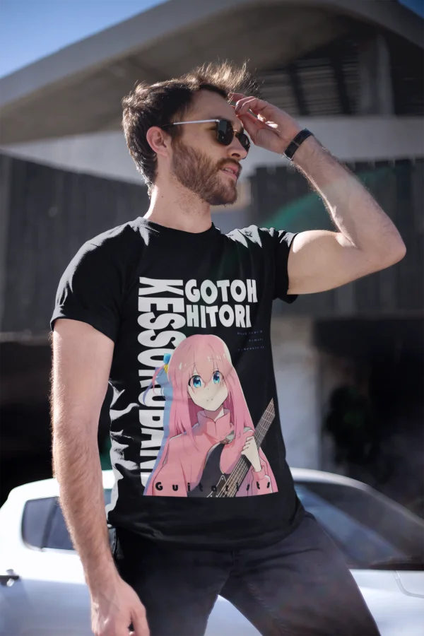 Dive into the world of Hitori Gotoh with this stylish tee, showcasing the iconic guitarist from the anime series. The bold design captures Gotoh’s quiet intensity and love for music, making it a must-have for anime and music fans alike.