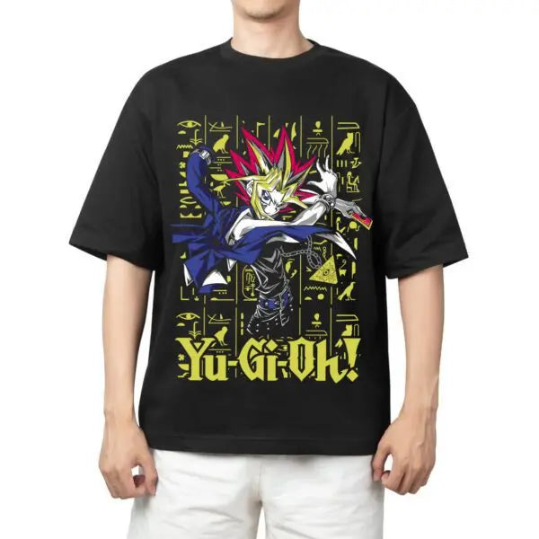 Here at Everythinganimee we have the best anime shirts in the world.
Step into the world of Yu-Gi-Oh! with this epic Yugi Duel Master Tee, featuring the iconic Yugi Muto ready for battle. With a vibrant design that showcases Yugi's fierce pose against a backdrop of ancient hieroglyphics.