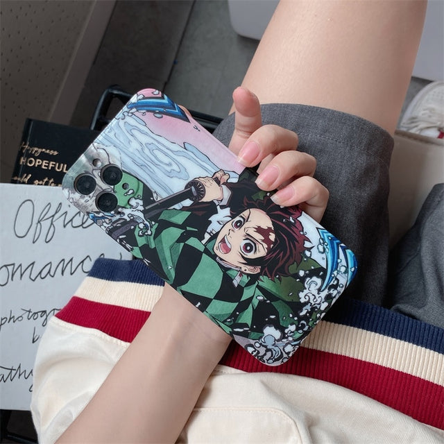 Get the cutest phone protection with our Demon Slayer anime phone case for iPhone 11, 12, 13, Pro, 7, 8 Plus, X, XR, XS Max. Show off your love for the series with this soft TPU cover featuring the iconic characters from Kimetsu No Yaiba. Shop now on our website!