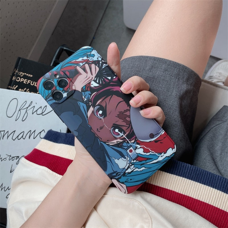 Get the cutest phone protection with our Demon Slayer anime phone case for iPhone 11, 12, 13, Pro, 7, 8 Plus, X, XR, XS Max. Show off your love for the series with this soft TPU cover featuring the iconic characters from Kimetsu No Yaiba. Shop now on our website!