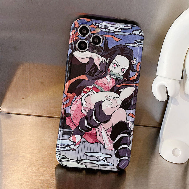 Get the cutest phone protection with our Demon Slayer anime phone case for iPhone 11, 12, 13, Pro, 7, 8 Plus, X, XR, XS Max. Show off your love for the series with this soft TPU cover featuring the iconic characters from Kimetsu No Yaiba. Shop now on our website!