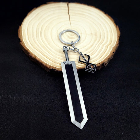 Shop now for the ultimate Berserk fan accessory - the Berserk Guts Sword Keychain Set! Made of durable zinc alloy, these keychains feature a detailed design of Guts' iconic sword and are perfect for showing off your love for the anime. Get them for yourself or as a gift for the Berserk fan in your life.